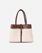 Mindy Tote with brown top section and beige bottom section on a white background
